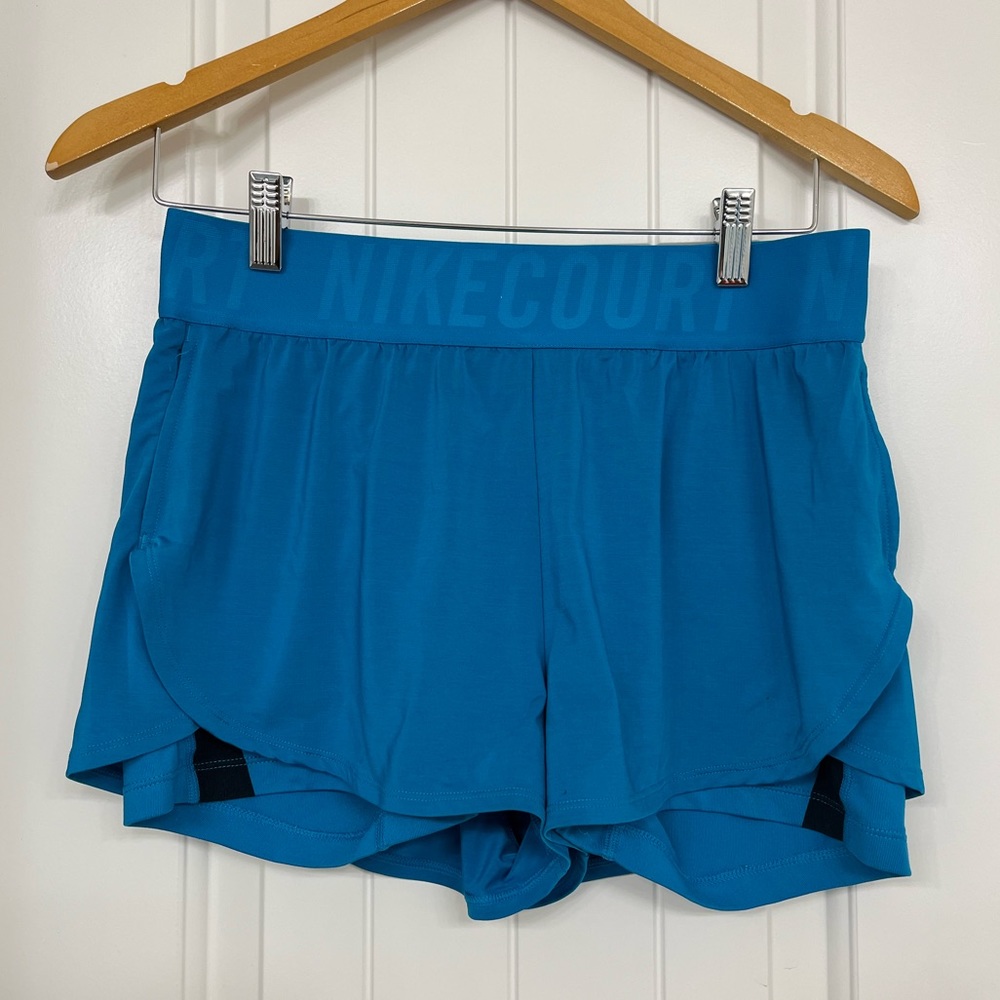 Blue Nike shorts